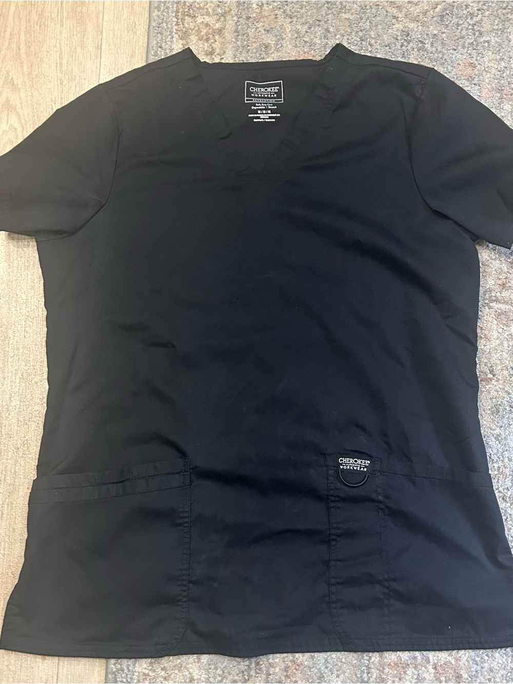 Women’s black Cherokee scrub set.